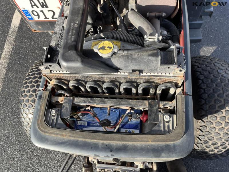 Kubota B2410 compact tractor with sweeper and salt spreader 28