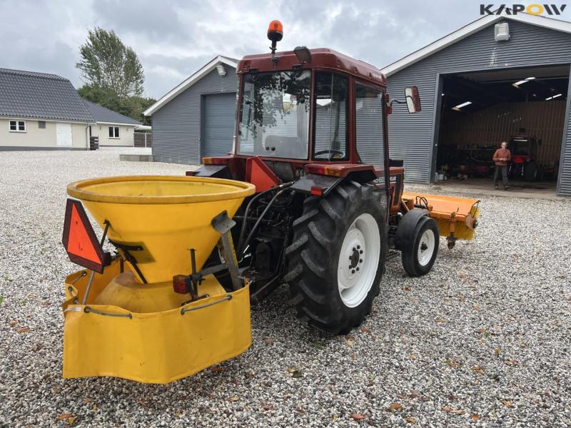New Holland 45-66S compact tractor with sweeper and salt spreader 5