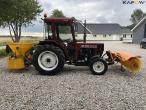 New Holland 45-66S compact tractor with sweeper and salt spreader 4