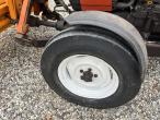 New Holland 45-66S compact tractor with sweeper and salt spreader 12