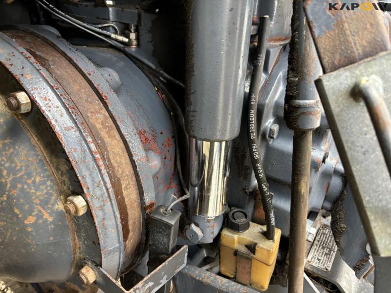 New Holland 8560 tractor with Hauer P-O-M S150 front loader 42