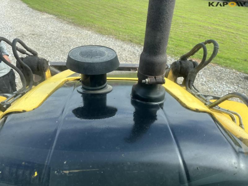 New Holland B115B backhoe loader 50