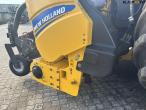 New Holland FR550 with corn header and pickup 82