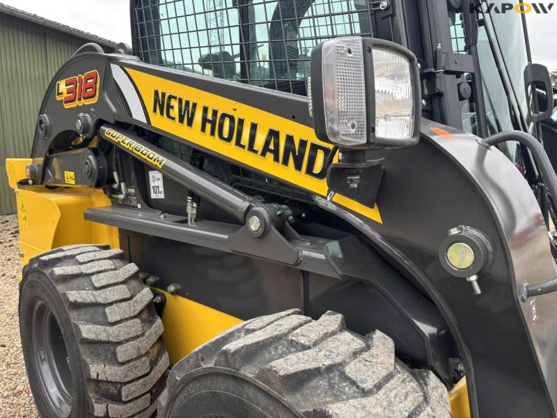 New Holland L318 skid steer loader 16