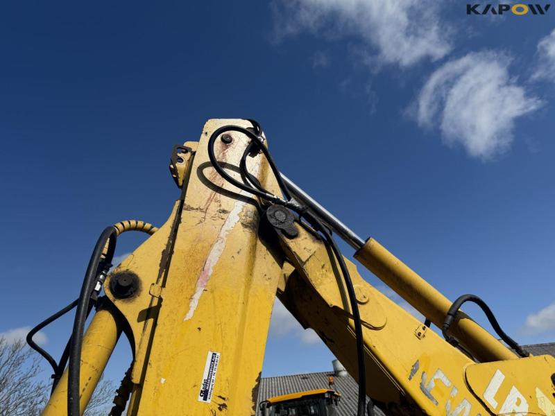 New Holland LB115B-4PS backhoe loader 22