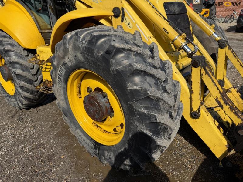 New Holland LB115B-4PS backhoe loader 49