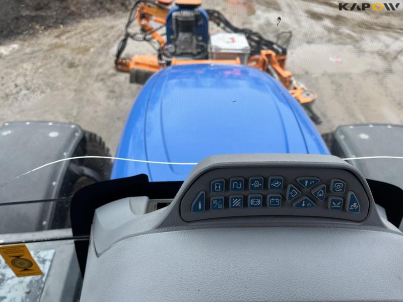 New Holland T6.150 tractor with Mulac arm mower 43