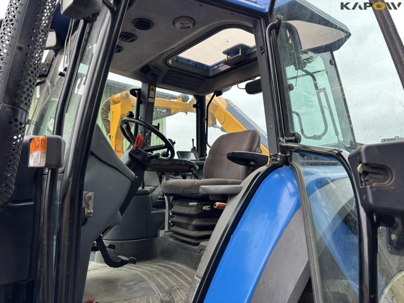 New Holland TS 115 with Bomford arm mower 43