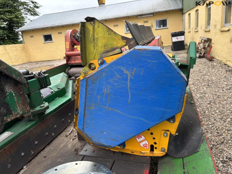 New Holland TS 115 with Bomford arm mower 102
