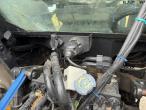 New Holland TS 115 with Bomford arm mower 30