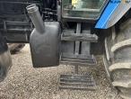 New Holland TS 115 with Bomford arm mower 35