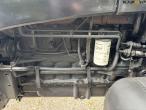 New Holland TS 115 with Bomford arm mower 38