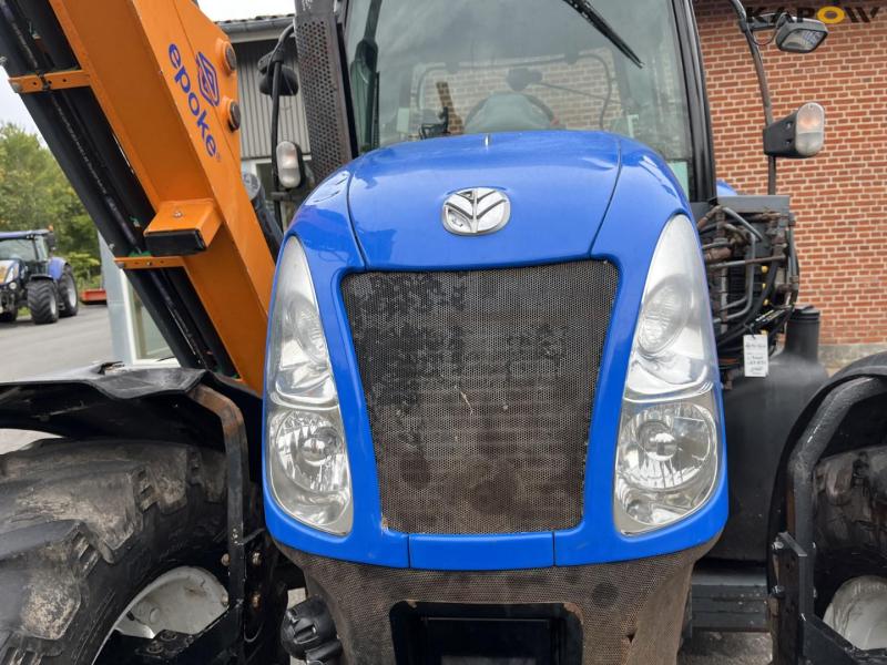 New Holland TS135A tractor with Epoke arm mower 17