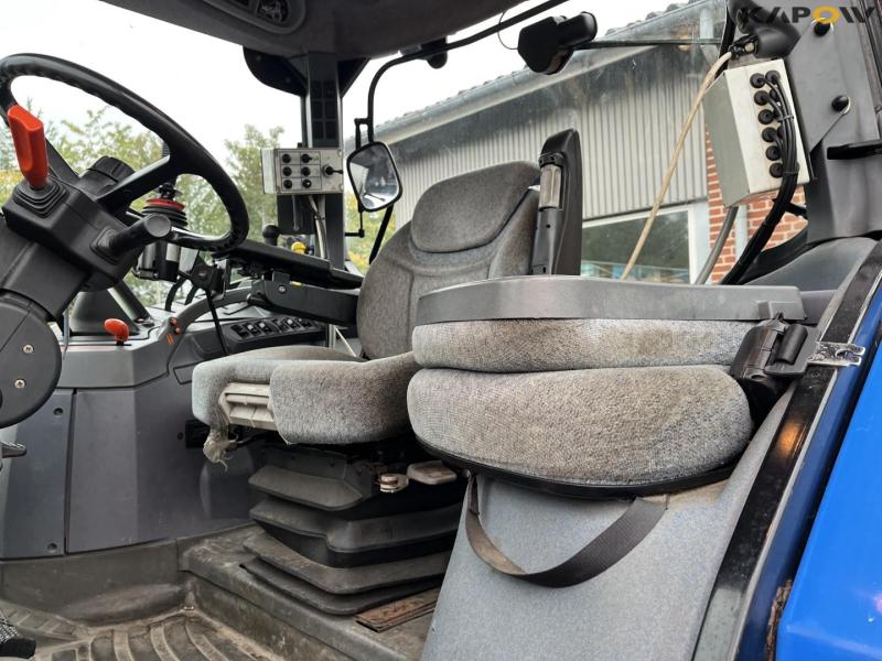 New Holland TS135A tractor with Epoke arm mower 29
