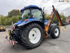 New Holland TS135A tractor with Epoke arm mower 5