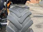 New Holland TS135A tractor with Epoke arm mower 14