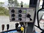 New Holland TS135A tractor with Epoke arm mower 40