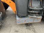 New Holland TS135A tractor with Epoke arm mower 42