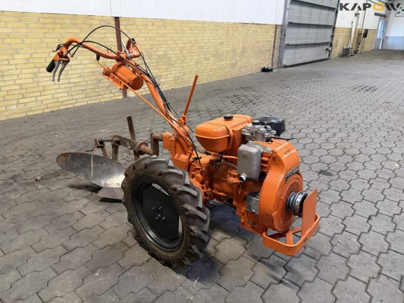 Nibbi tool carrier with plow 3