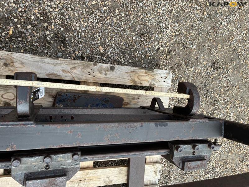 Pallet forks on heavy-duty frame 12
