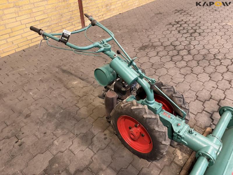 Tool carrier with cylinder mower 14