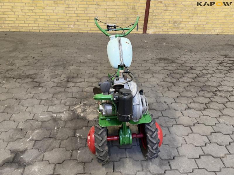 Tool carrier with plow 2