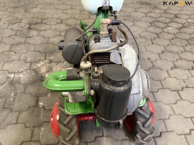 Tool carrier with plow 14