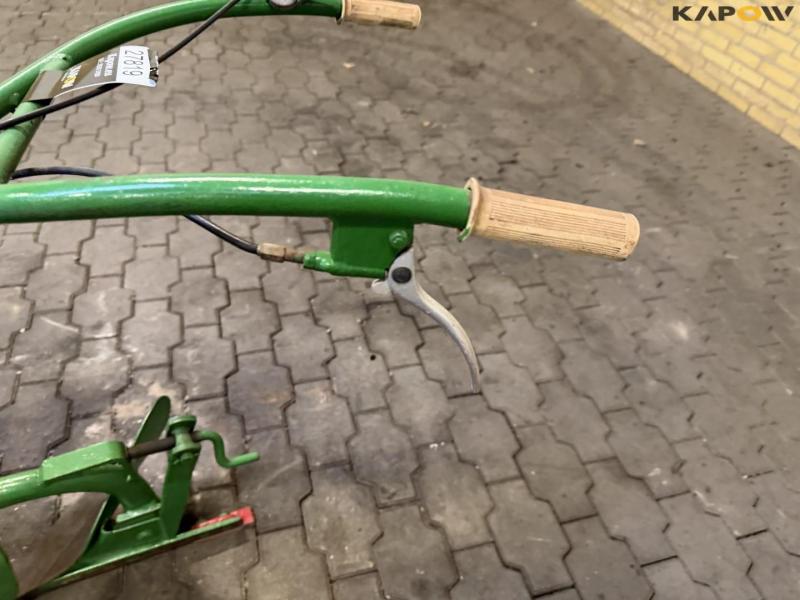 Tool carrier with plow 20