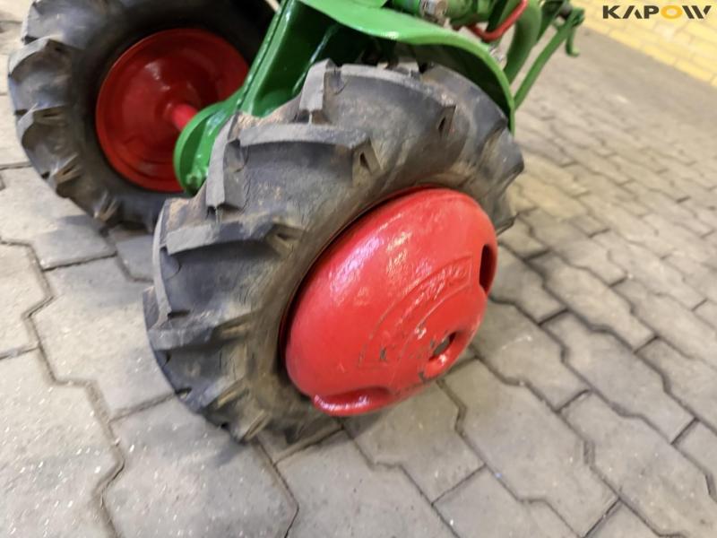 Tool carrier with plow 24