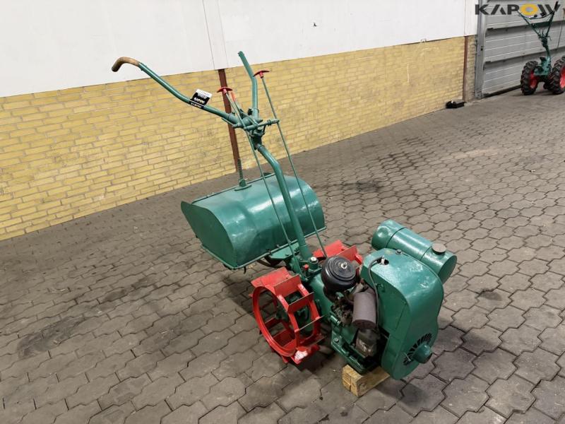 Tool carrier with spring cutter 3