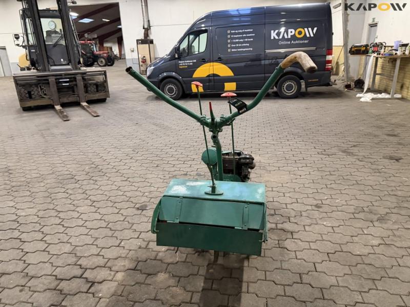 Tool carrier with spring cutter 6