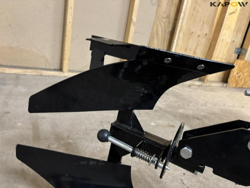 Tool carrier with tiller 64