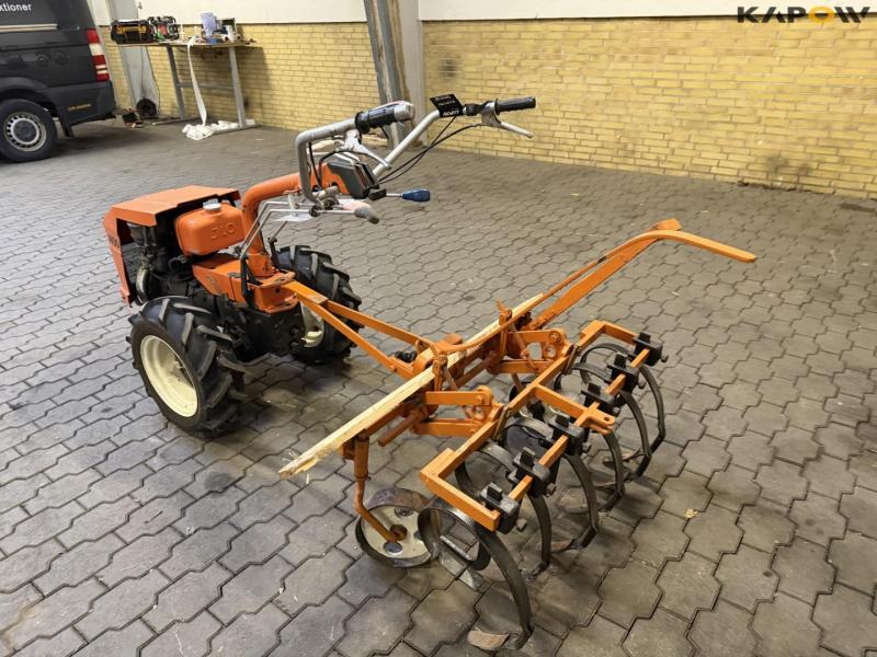 Tool carrier with harrow 7