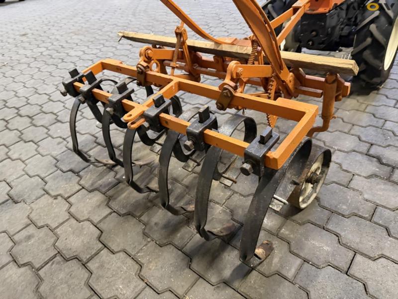 Tool carrier with harrow 38