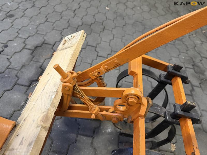 Tool carrier with harrow 43