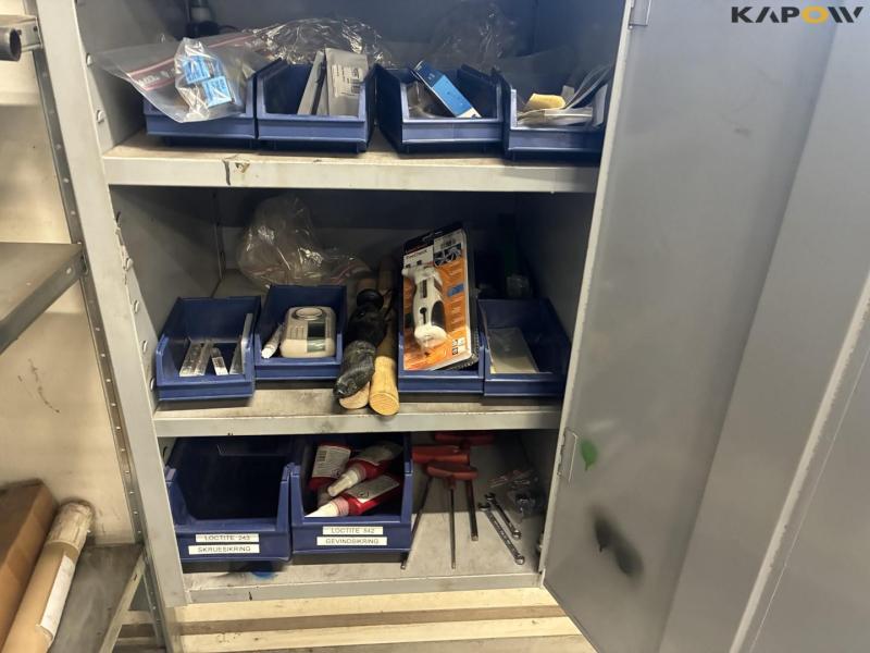 Shelves and cabinets with contents 25