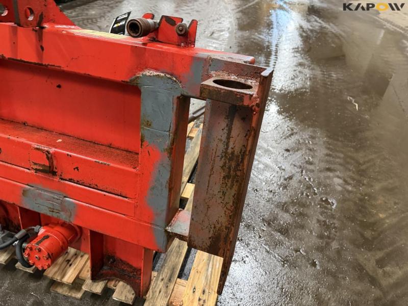 Round bale rolls with John Deere hitch 11