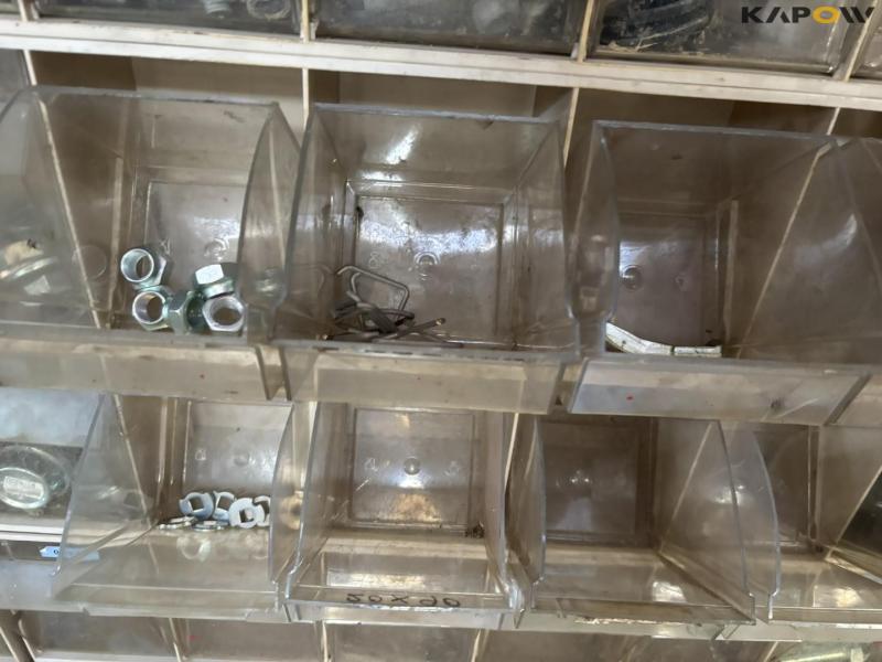 Assortment shelf with contents 26