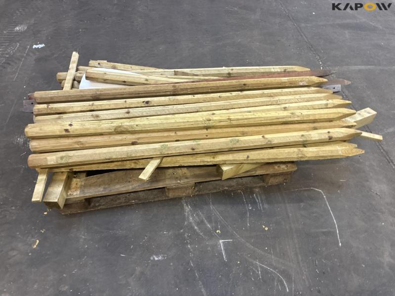 Pressure-treated wooden posts 12