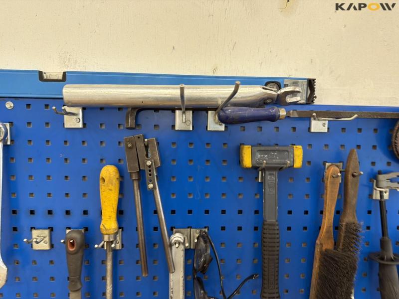 Workshop table with tools and blackboard 13