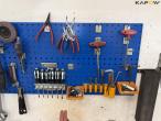 Workshop table with tools and blackboard 4