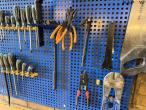 Workshop table and blackboard with tools 11