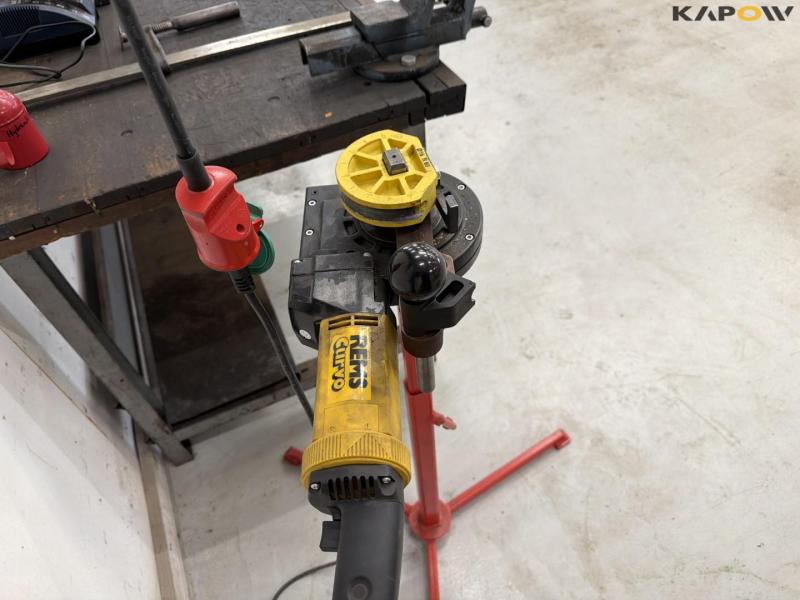 Tool table with tools + wall cable reel 28