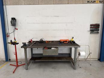 Tool table with tools + wall cable reel