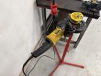 Tool table with tools + wall cable reel 27