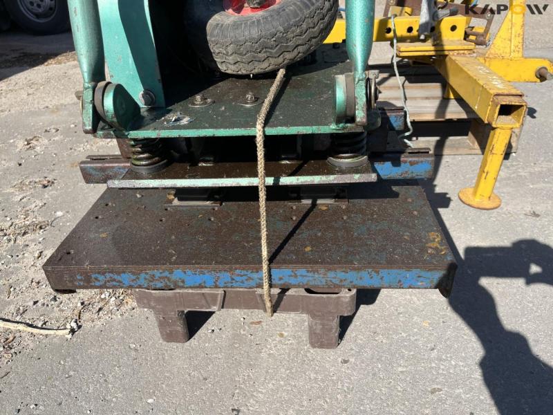 Roadside tractor bracket for plate vibrator 12