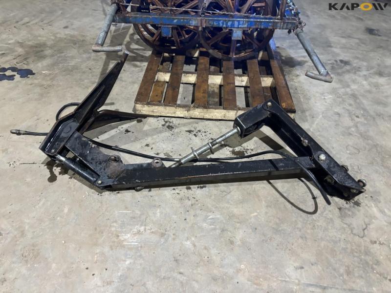 Silage packer roller with collecting arm 5