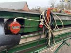 Potato planter with belt spreader 22
