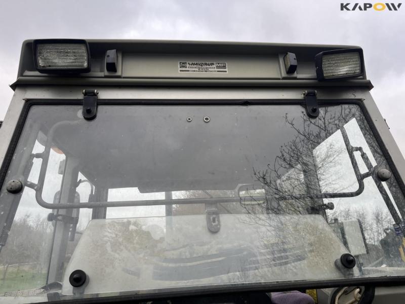 Massey Ferguson 390 tractor with arm mower 39