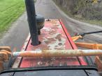 Massey Ferguson 390 tractor with arm mower 52